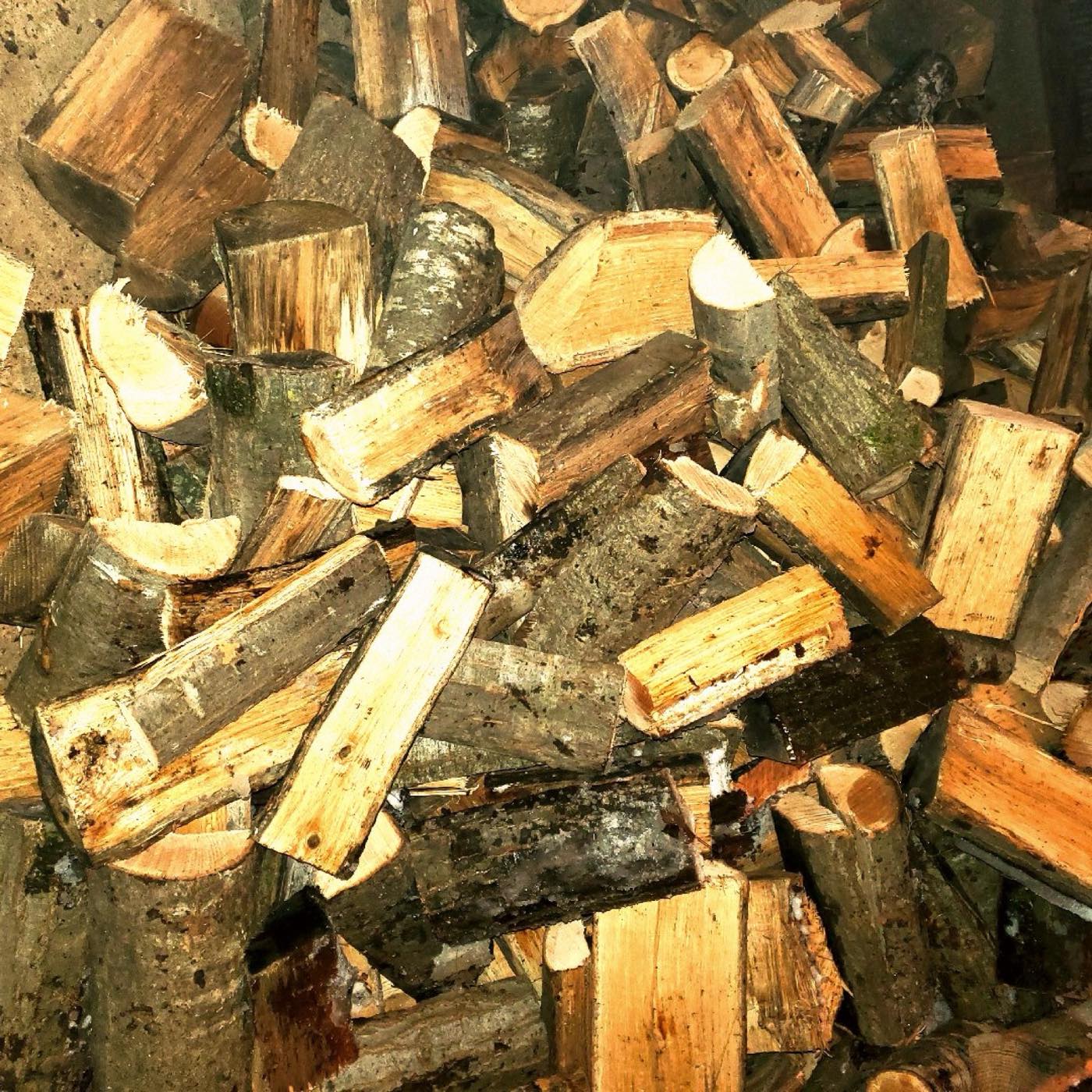 Pile of hardwood smoking chunks cut to roughly three to four inches